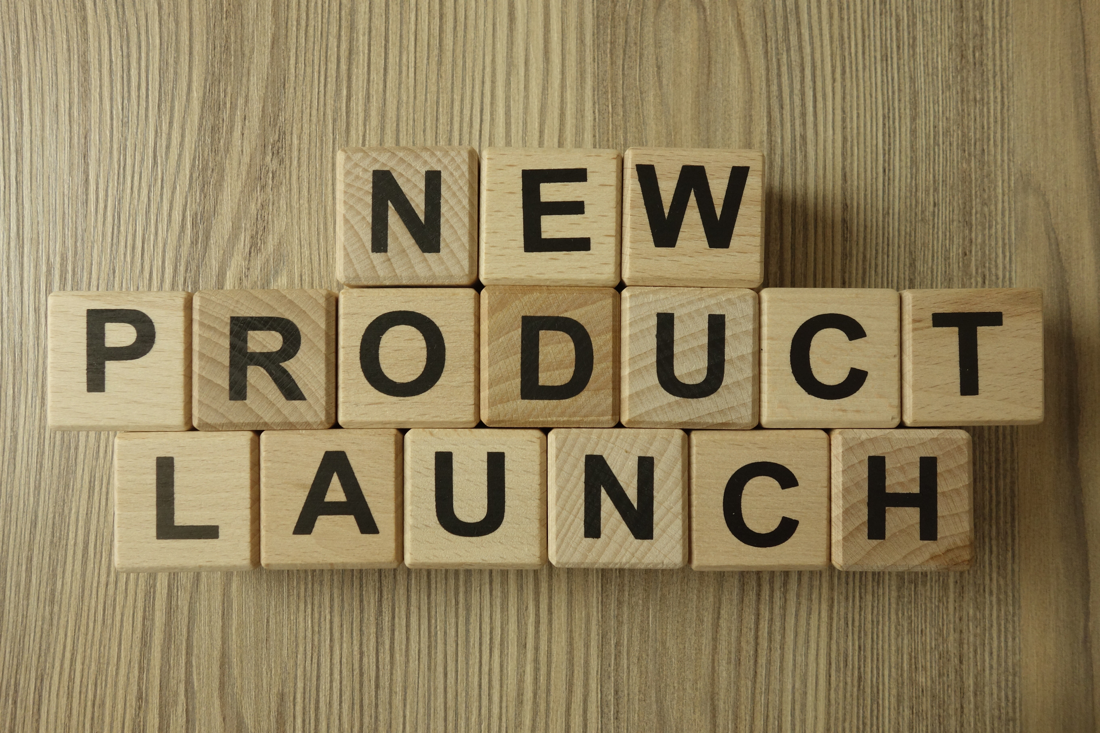 New product launch text from wooden blocks